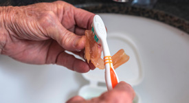 Be sure to clean your dentures well after eating
