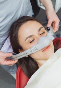 Woman afraid in the dental chair