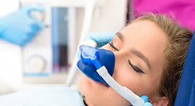 Lady receives nitrous oxide treatment