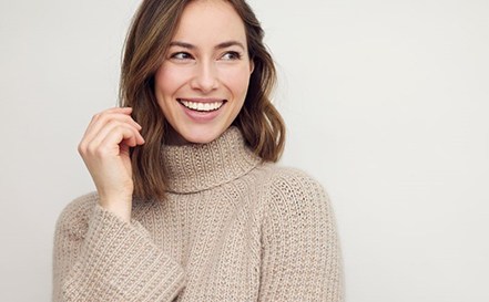 Smiling woman with veneers in San Antonio, TX