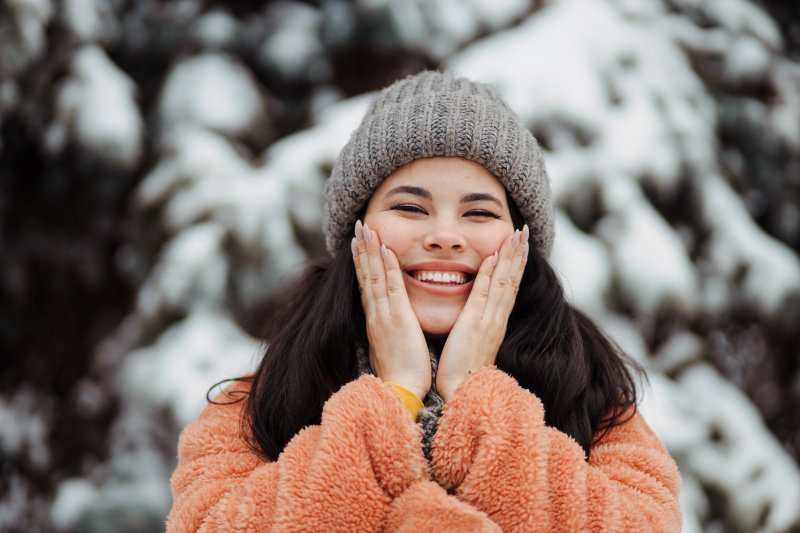 Lady smiles in snow